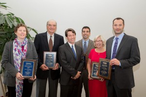 2015 Worrilow Award Winner Erica Spackman (left) displays her plaque alongside CANR Distinguished Alumni Award winners. Joining them is CANR Dean Mark Rieger (third from left). For the full story on the 2015 award and additional photos, click 