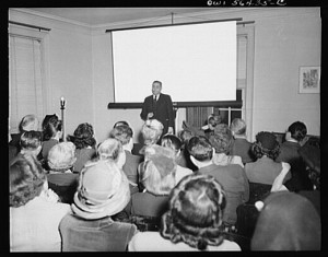 The presentation technology has changed, but Alison's audience was likely as engaged as was the audience pictured here in 1944 at the United Nations Club in Washington, D.C. (Courtesy Library of Congress)