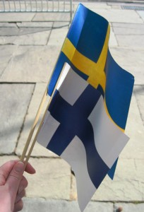 Each attendee received two flags. Although the commemorators wanted to celebrate the Swedish and the Finnish colonists equally, Sweden's flag was larger. Some of the commemorators of the 300th anniversary in 1938 did not want the Finns involved at all.
