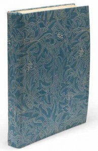 William Morris’s The Works of Geoffrey Chaucer Now Newly Printed, commonly called the Kelmscott Chaucer and printed at Morris’s Kelmscott Press in 1896. The book is seen here in a slipcover made in the early twentieth century from William Morris fabric.