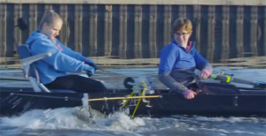 QuadCrew team member Molly Wessel tests the adaptive rowing device on the water, under the watchful eyes of Prof. Jenni Buckley, Mechanical Engineering