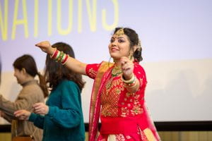 A woman dances during the Festival of Nations Celebration held at Trabant University Center.