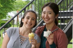 Two ELI students enjoy ice cream at the ELI Summer Picnic.