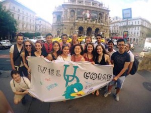 This is a photograph of the students in my program group. We are holding a banner that the medical students at Simmelweis University made for us, and held up when they picked us up at the airport. We are standing in front of a famous opera house in Budapest.