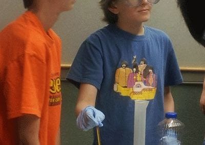 Two students doing an experiment