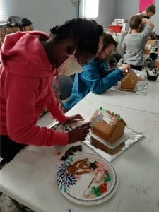 Heritage 4-H Club working on gingerbread houses