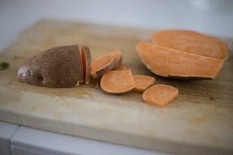sweet potato on a cutting board