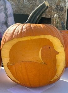 carved pumpkin with a duck