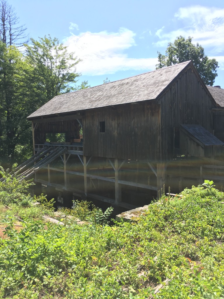 Old Sturbridge Village is famous for its historic saw and grist mills. Guests are able to enter the buildings and see the water-powered machinery at work. Photograph taken by Trevor Brandt