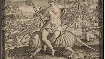 Ink engraving on paper showing a woman with a feathered headdress, nude above the waist, sitting on an oversized armadillo, carrying a bow and an axe. In the background are two armies battling one another and three cannibals cooking human limbs over a fire.