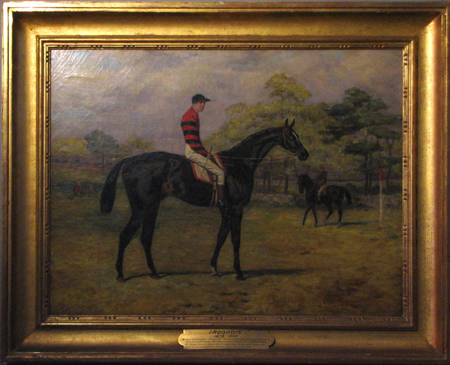 Figure 4. Painting of black horse facing right with jockey on its back and other horse and jockey in the background. 