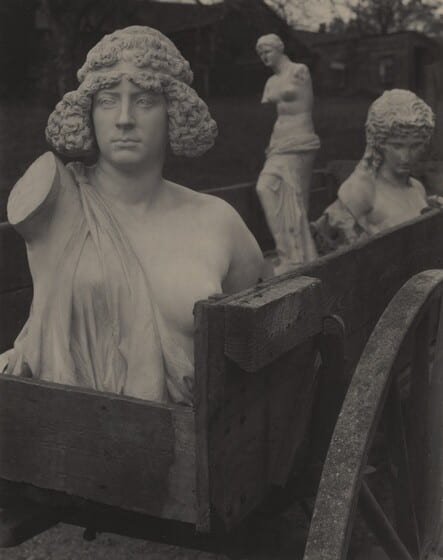 Fig. 5. Photograph of wooden cart with three antique sculptures. 
