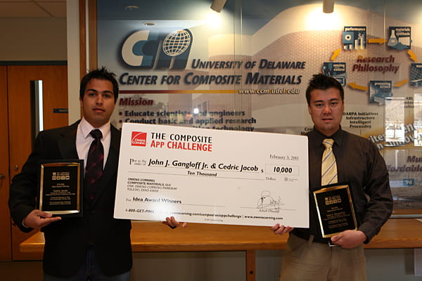 Cedric Jacob, left, and John Gangloff with their Composite App Challenge winnings.