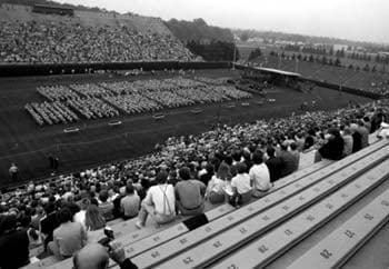 A crowd of relatives and friends watch the 1979 University of Delaware commencement ceremony at Delaware Stadium