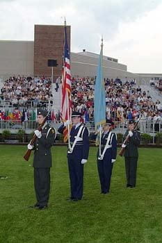 An honor guard composed of members of the University of Delaware Army and Air Force ROTC programs participates in the 2003 commencement ceremonies.
