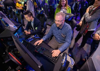 Guests try their hand at the video game stations