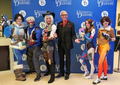 USC staff poses with Overwatch Cosplayers