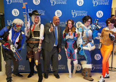 José-Luis Riera poses with Overwatch cosplayers