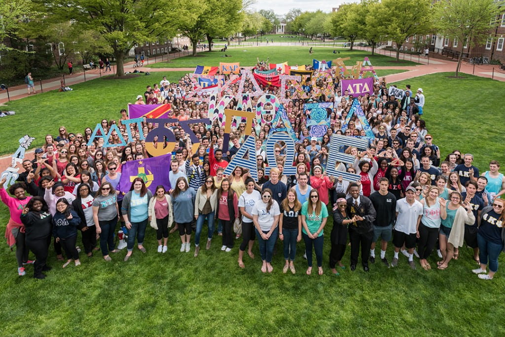 Group photo of Greek Chapters members on the Green