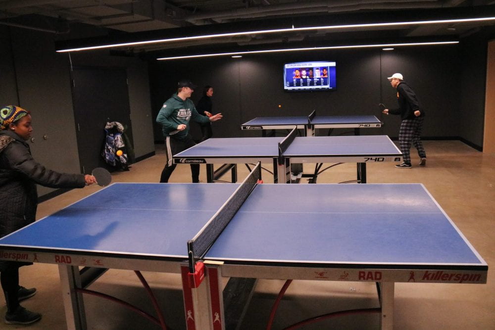 students playing table tennis in Hen Zone