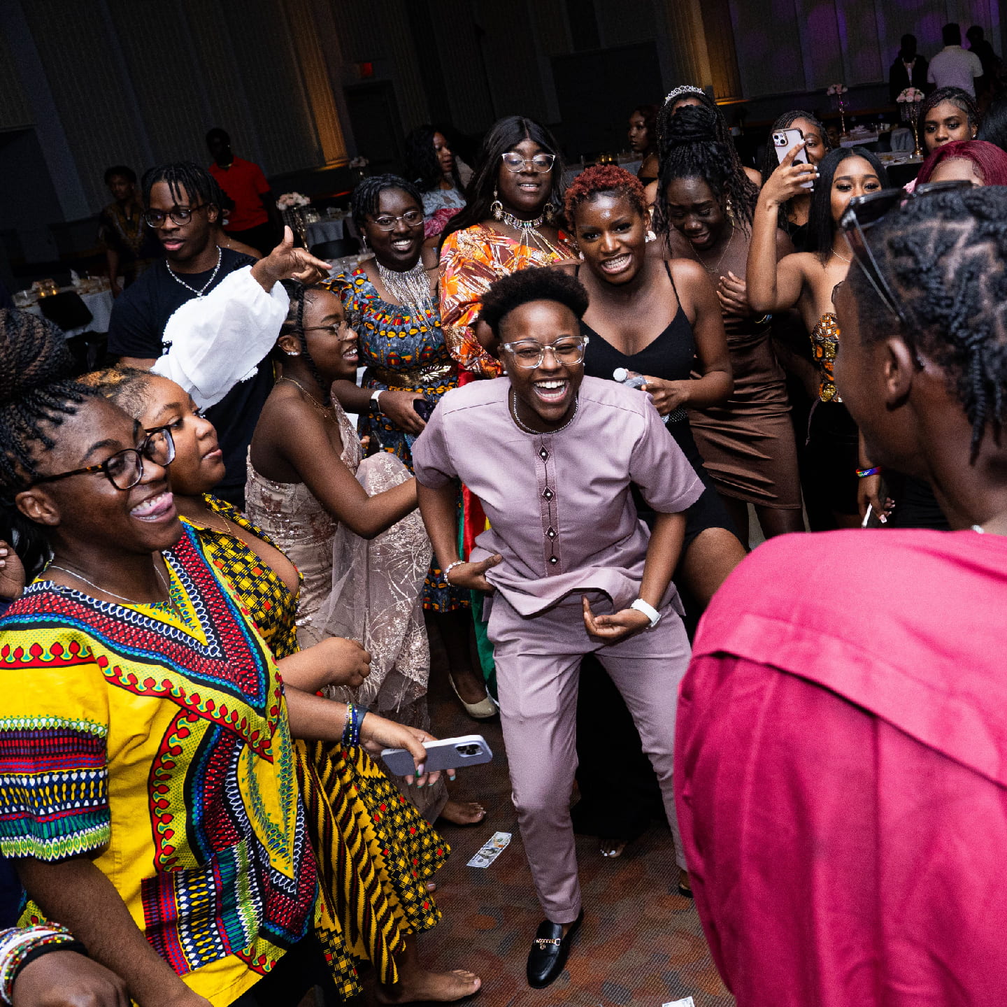 a group of African Americans dance at a party