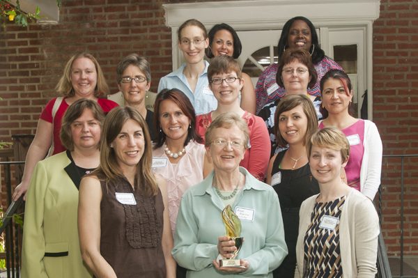 The Women's Caucus presents the 2012 Torch Bearer Award to Anne Boylan.