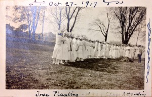 Tree planting ceremony in 1917 by the students of the Women's College.  Courtesy of the University Archives